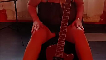 Blonde Amateur Indulges In Female Masturbation While Playing Guitar