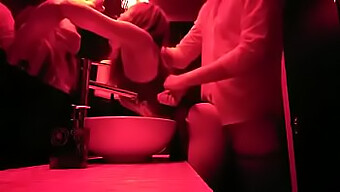 Men Engage In Sexual Activity In The Men'S Restroom At A Nightclub