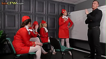 A Group Of Female Flight Attendants In Nylon And Heels Perform Oral Sex On A Man In A Bdsm Setting